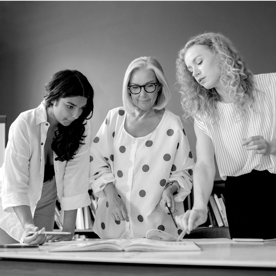 Three female professionals learning together