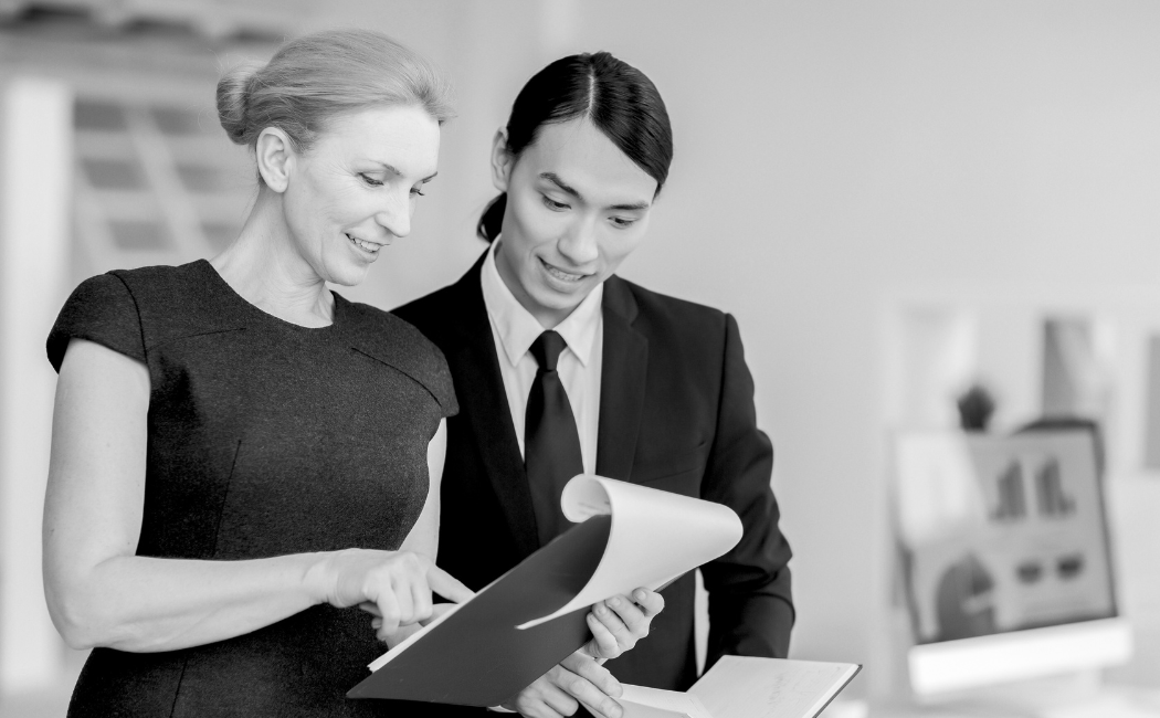 Manager reviewing documents