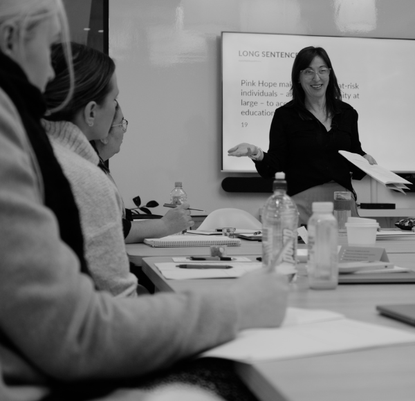 Woman presenting to a room