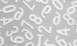 Scattered numbers representing raw data before it is turned into a story