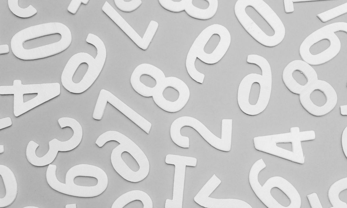 Scattered numbers representing raw data before it is turned into a story